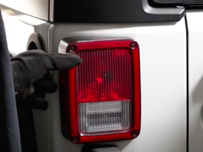 How to replace a lightbulb on a Jeep Wrangler - Car Ownership - AutoTrader