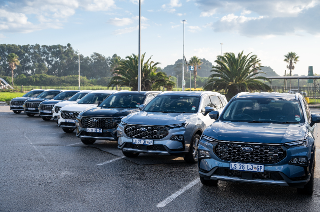A lineup of different-coloured Ford Territory models on launch. 