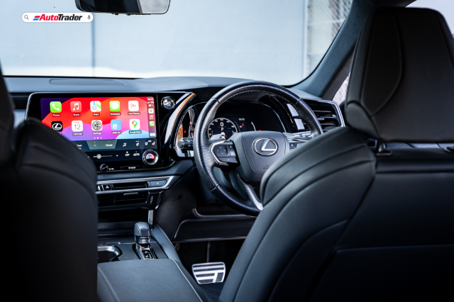 View of the interior of a Lexus RX 350 F-Sport from the back seats
