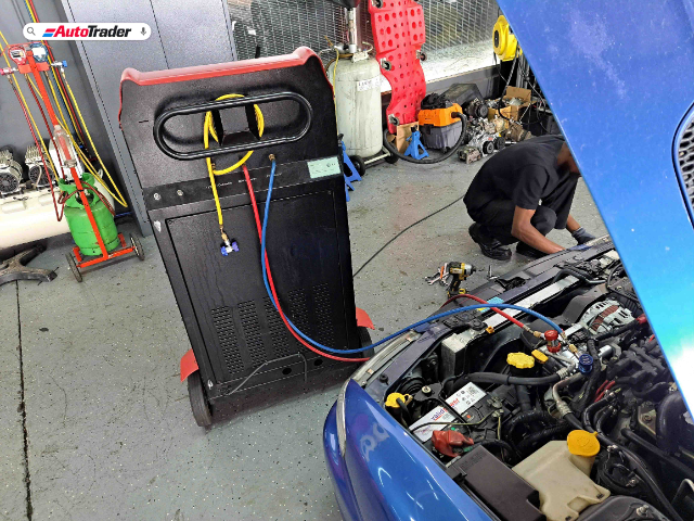 Provide alt text for this image of a Subaru Impreza getting it’s air conditioning compressor replaced at Bens Auto Aircon in Randburg