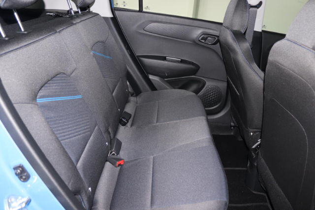 The rear bench offers decent enough legroom for two adults.