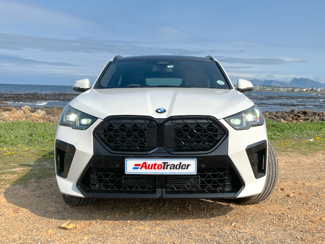 A white X2 with black grille, viewed straight from the front.