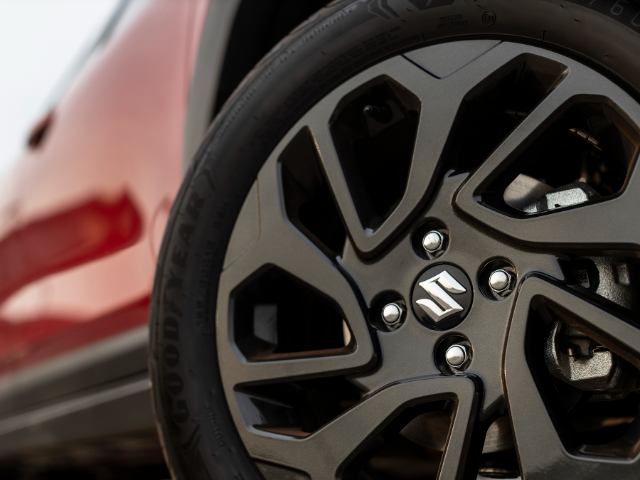 Close up shot of the black wheel of a Suzuki Fronx