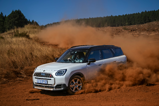 A Mini Countryman S kicking up dust.