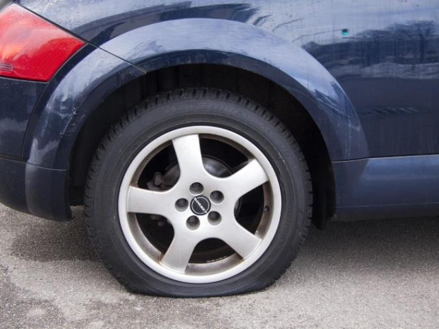 car with a flat wheel