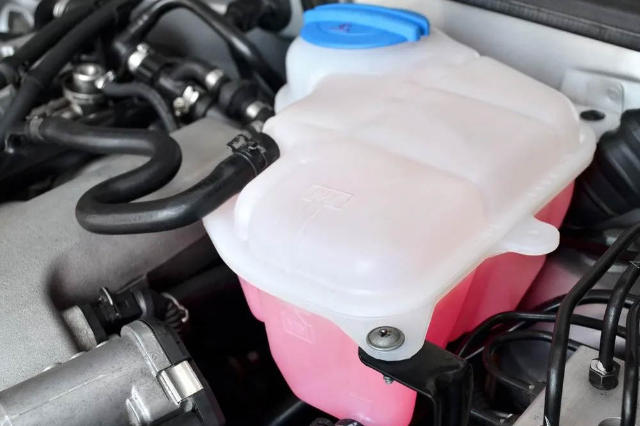 Coolant reservoir in a car