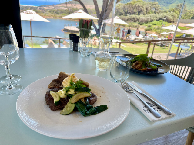 Cape Point Vineyards in Cape Town with food in the foreground.