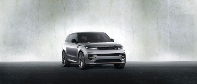 A silver Range Rover Sport seen from the front.