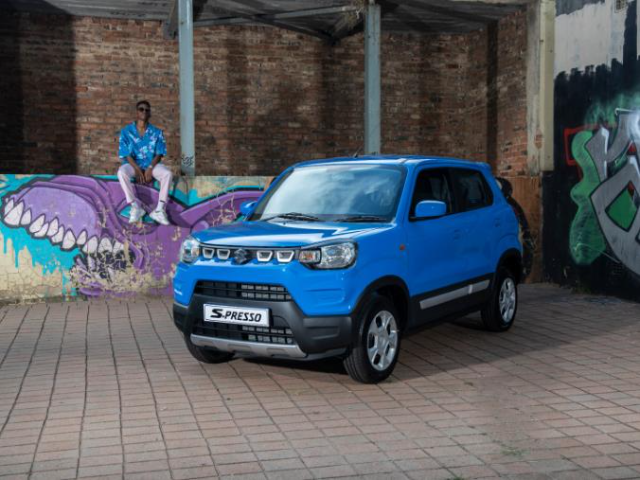 A blue Suzuki S-Presso.