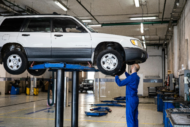 Mechanic working on a car