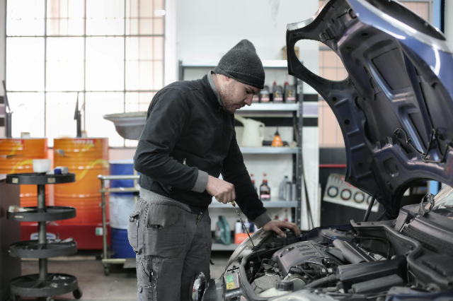 Mechanic working on a car