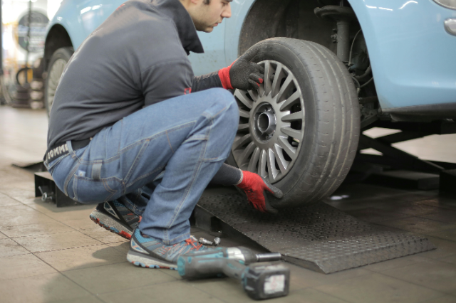 Mechanic working on a car