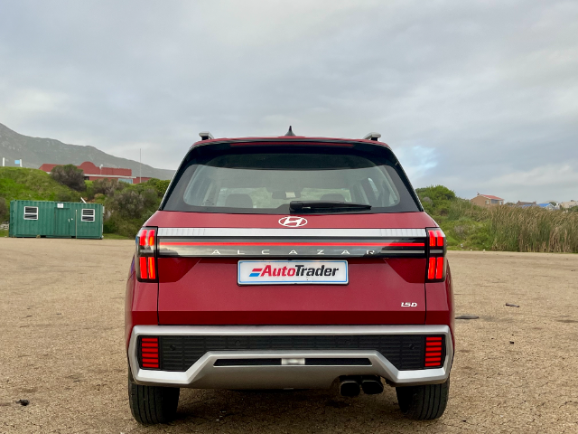 The rear view has some styling cues resembling the bigger Kia Sorento.