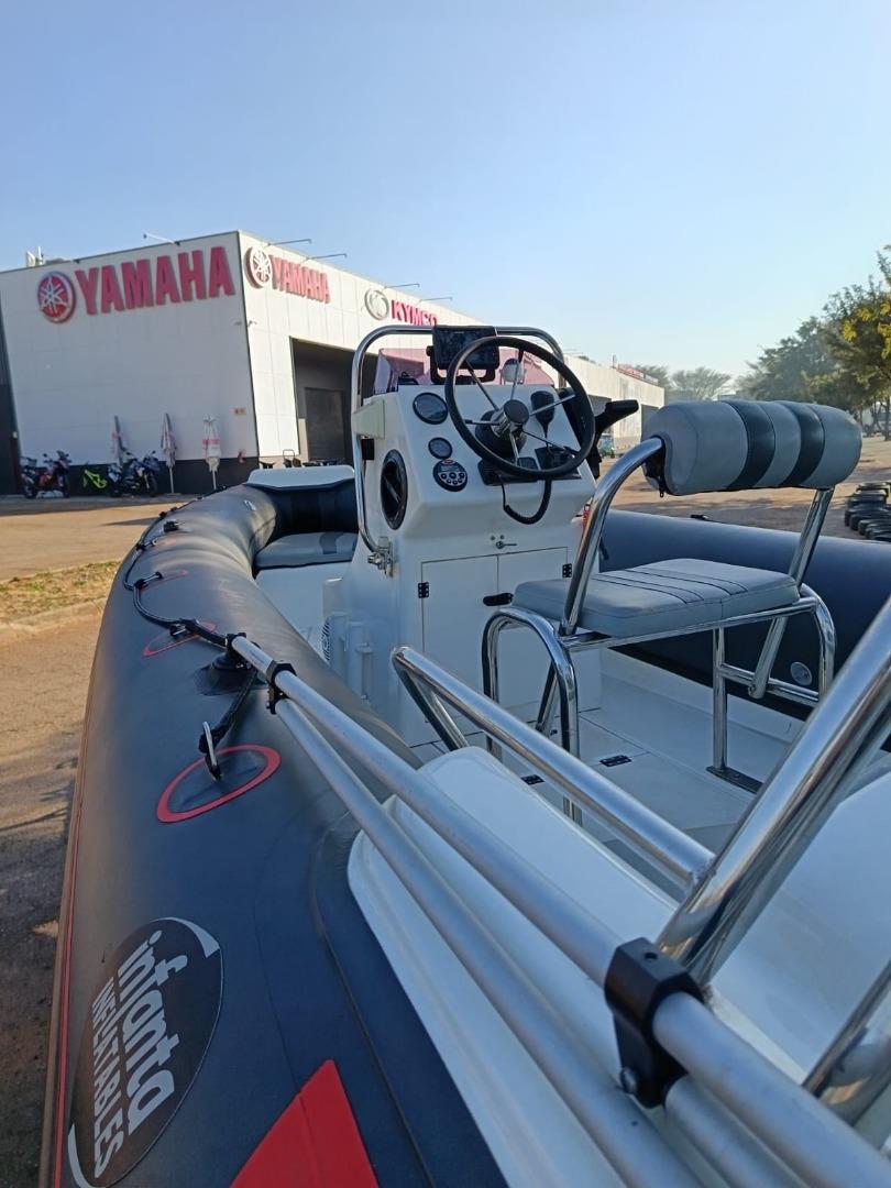 Infanta 5.2 Semi Rigid Center Console with a F100 Suzuki motor Linex