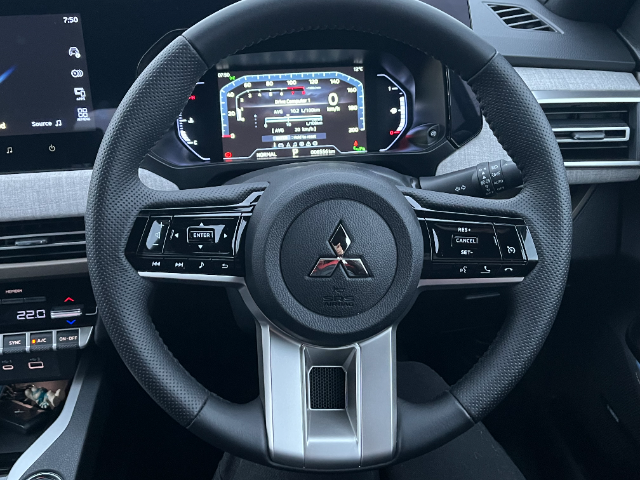 The steering wheel of the Mitsubishi Outlander Sport.