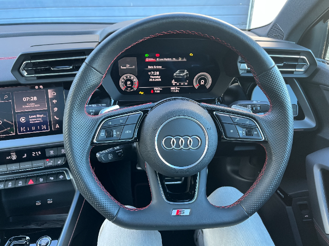 One look at this steering wheel and you just want to head out on some twisties.