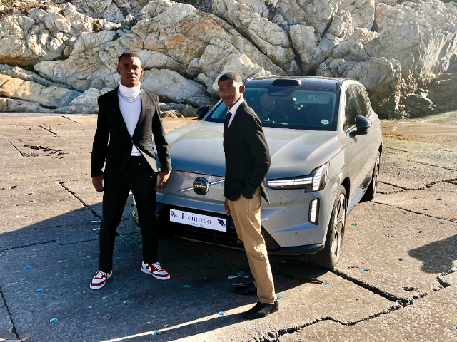 The boys, dressed to the nines, with their chauffeured Swedish chariot for the evening.