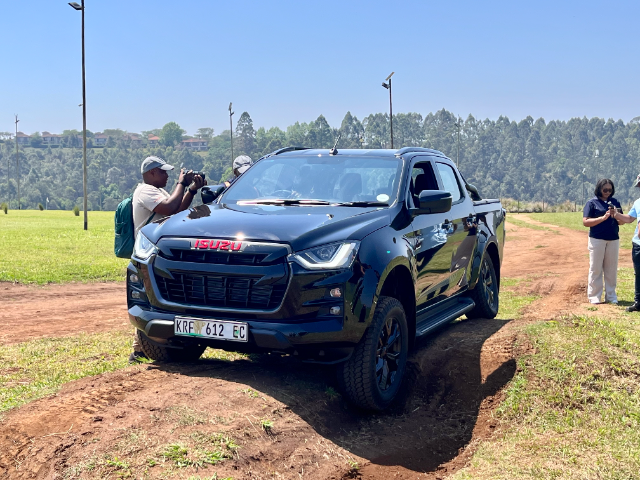 Taking the X-Rider Black over an obstacle at Clifton Canyon 4x4 track.