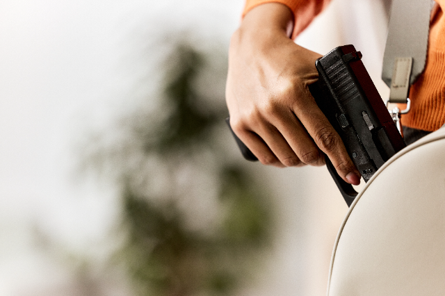 If you know how to use a handgun and have a license for it, you can carry it in your handbag, but be aware of the repercussions if used.