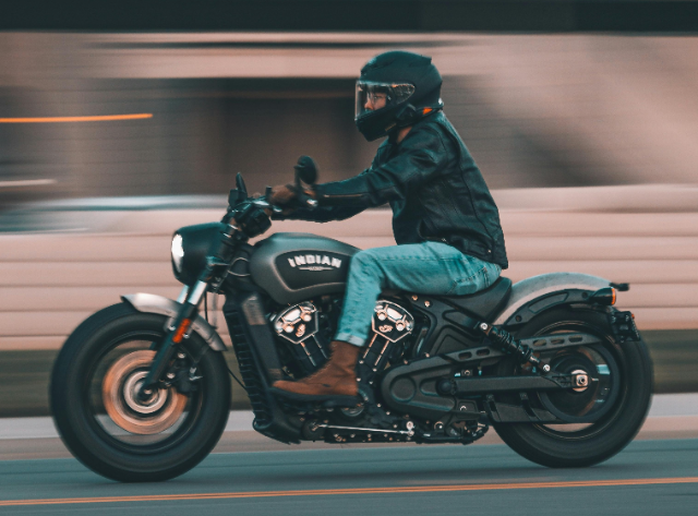 Motorcycle riding on city street