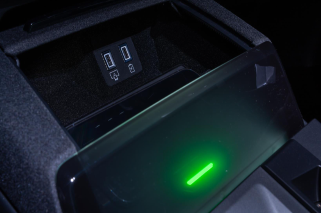 Your phone has its own private, illuminated charging area!