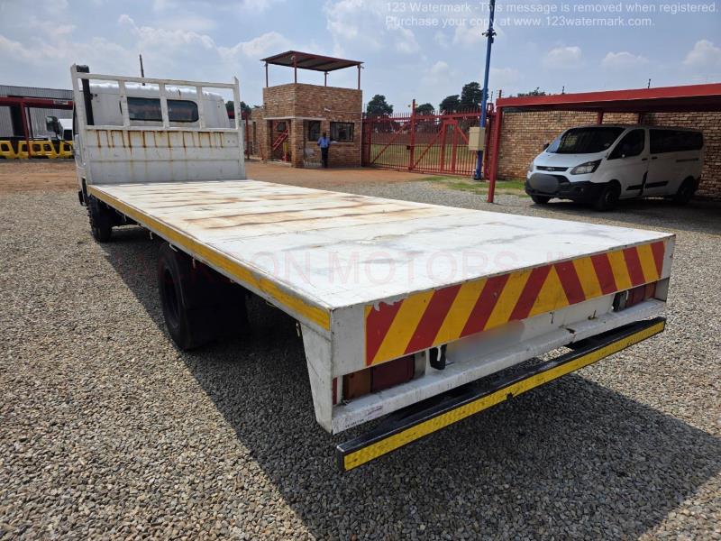 Nissan UD UD , 4x2, MANUAL, FITTED WITH 6.000 METRE LONG FLAT-DECK
