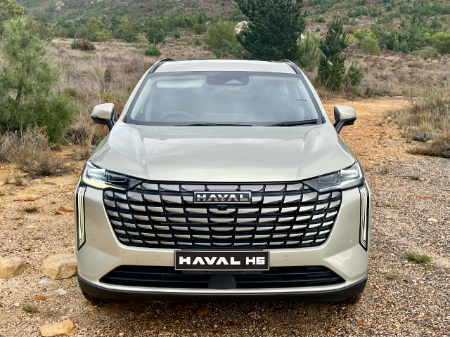 Haval H6 HEV on a dirt road.