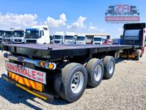 TOP TRAILER TRI-AXLE FLAT DECK Za Trucks and Trailers