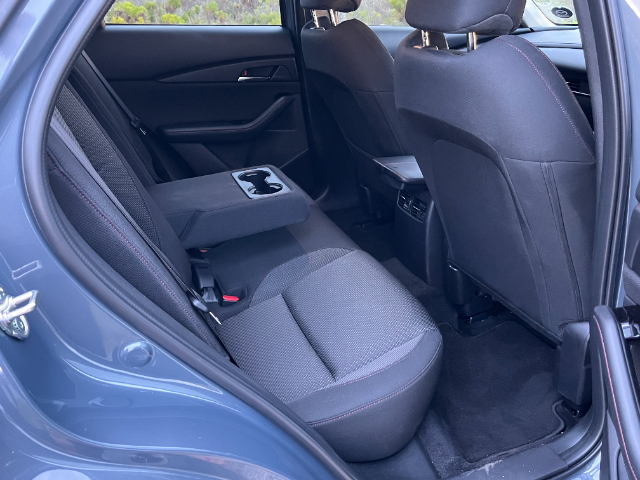 Rear seats and armrest of Mazda CX-30 in Carbon Edition trim.