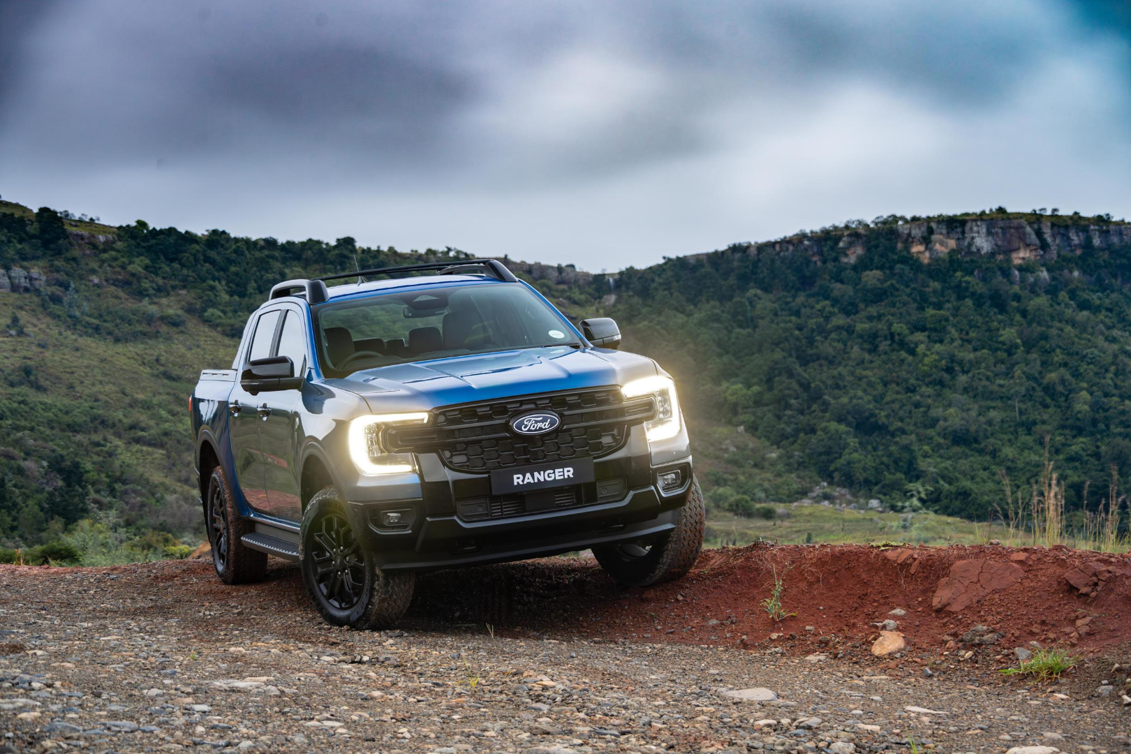 The Ford Ranger Sport in V6 trim on a dirt road.