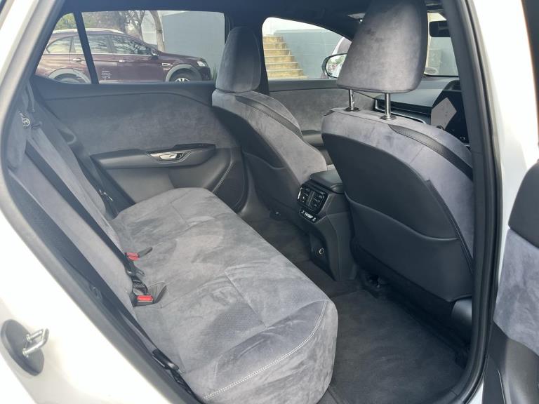 The grey suede-like interior in the Lexus RZ in SE trim. Seen here is the second row of seats.