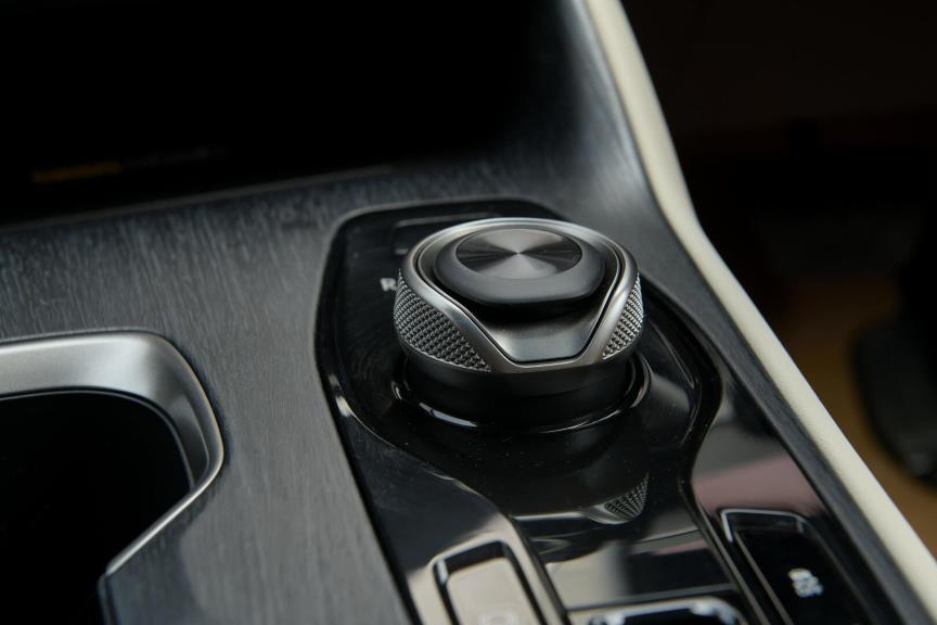 The rotary dial in the Lexus RZ with D, N, and R designations.