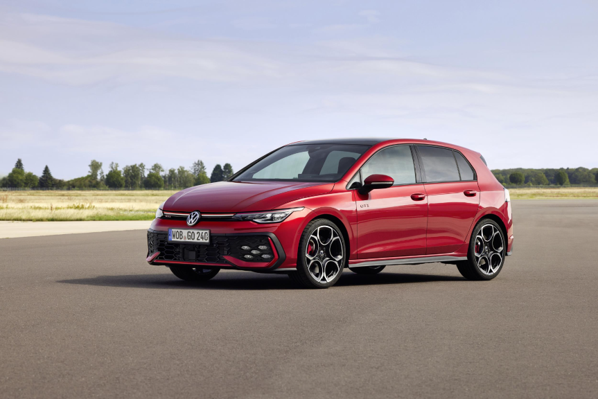A red Golf GTI 8.5 parked on German asphalt.