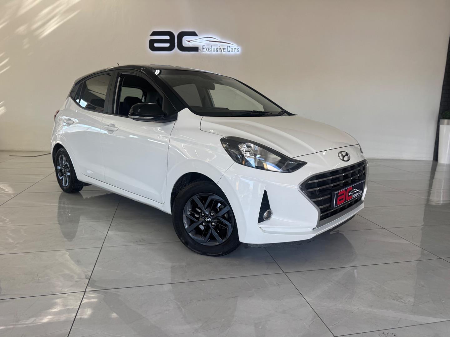 Hyundai Grand i10 1.0 Fluid AC Exclusive Cars