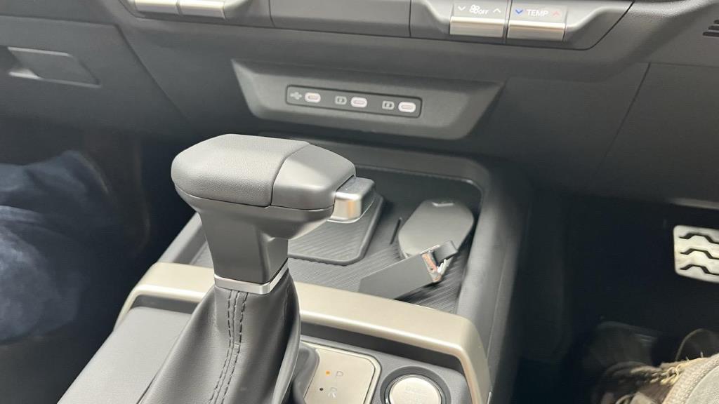 Plenty of spots to plug in and a handy rubberised charging mat prevents your phone from shifting.