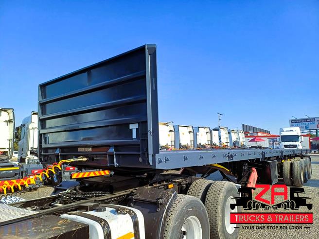 2023 HENRED FRUEHAUF TRI-AXLE FLAT DECK TRAILER OCT PRICE DROP! for sale