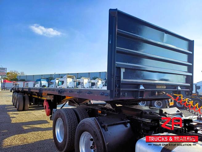 HENRED FRUEHAUF TRI-AXLE FLAT DECK TRAILER OCT PRICE DROP! Za Trucks and Trailers